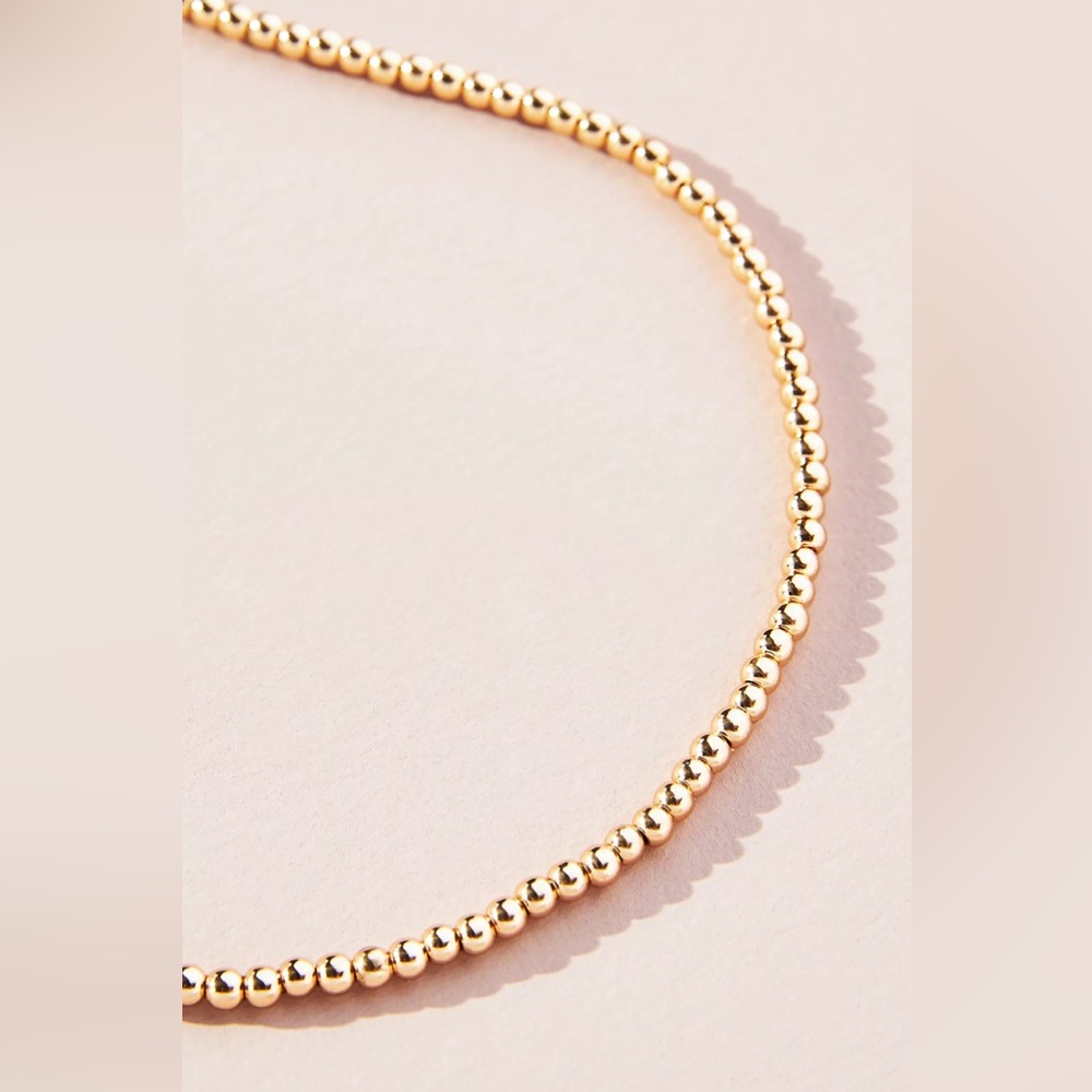 New classic gold small beaded necklace. Gold color.